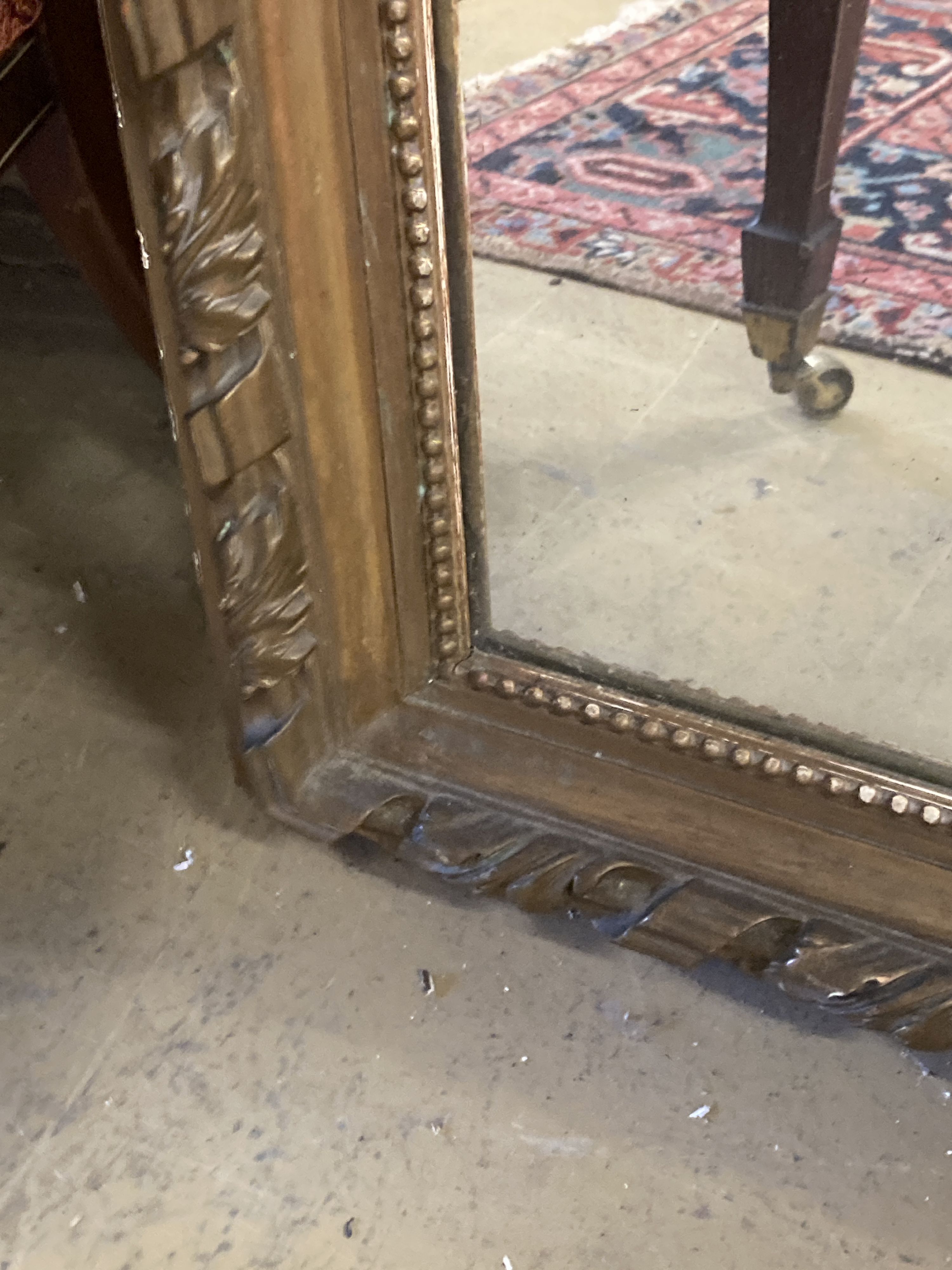 A Victorian arched giltwood overmantel mirror, width 80cm, height 118cm